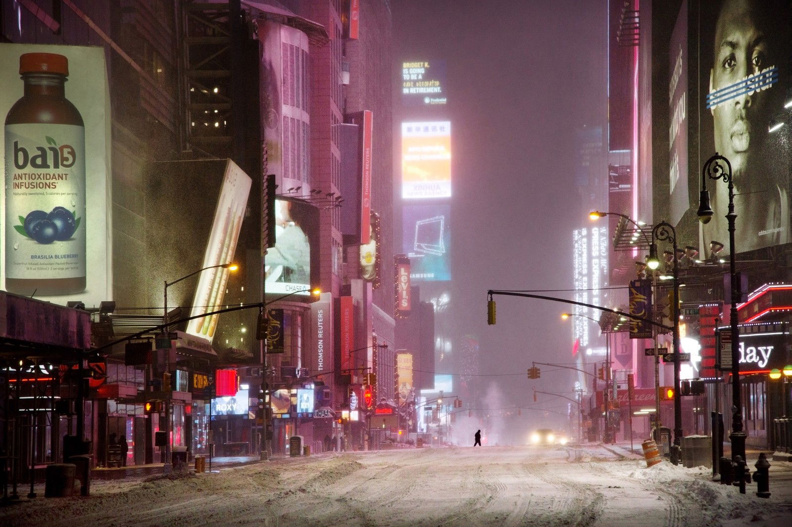 Man in times square by Christophe Jacrot Man in times square by Christophe Jacrot