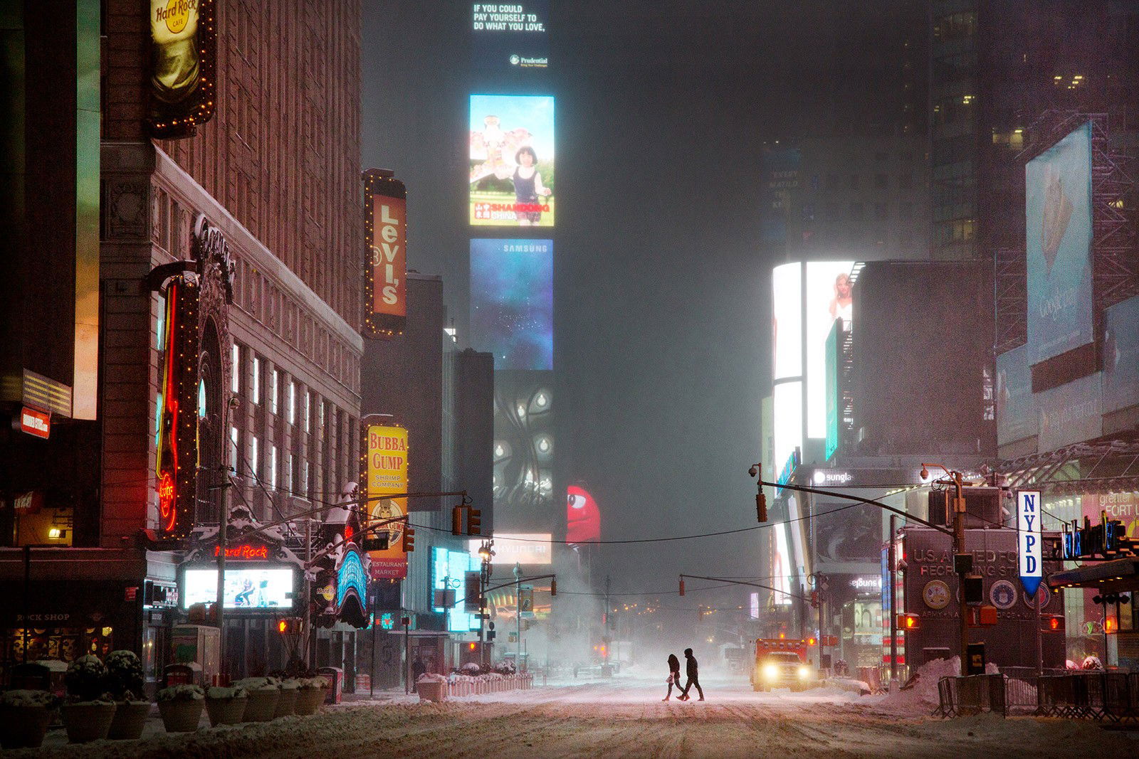 Couple in times square by Christophe Jacrot Couple in times square by Christophe Jacrot